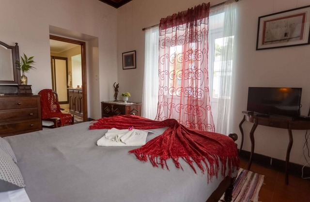 Pool suite with marble bath in exotic fruit orchard