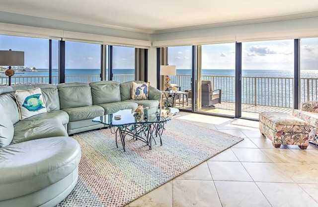 Premier Oceanfront Top Floor Condo With Wraparound Balcony & Windows
