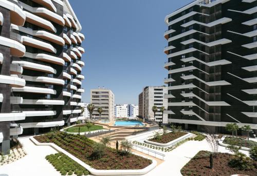 Premium Flat w/Balcony & Pool by HostWise