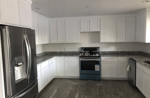 Private and Comfortable 4 bedroom home with office and pool