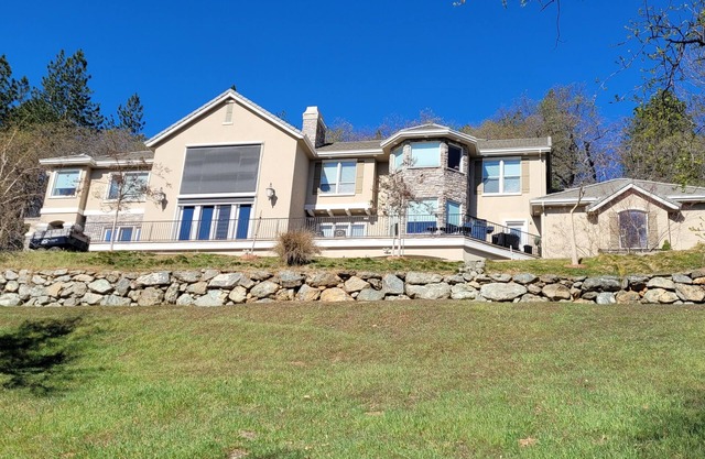 Private apartment attached to three story hillside home