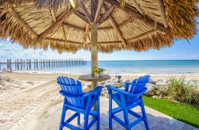 Private, Gated, Oceanfront, Beachfront 5-Star Estate with dock, putting green.