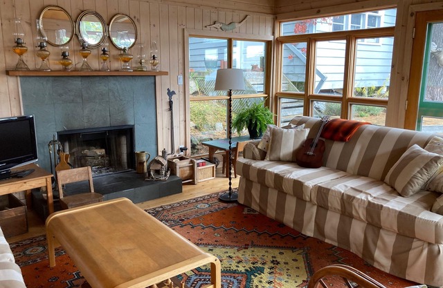 Private island on Lake Rosseau in Muskoka: beautiful cottage plus log cabin.