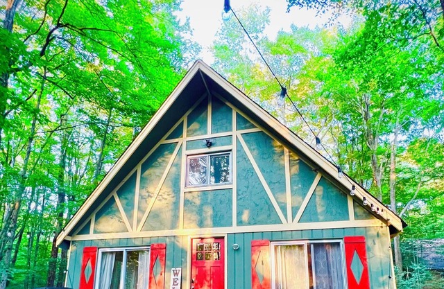 Private Lake Chalet w/ Heated Pools, Beach & Firepit!