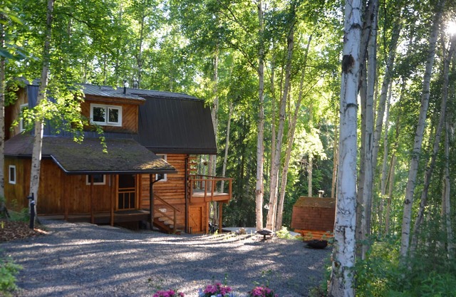 PRIVATE LOG HOME NESTLED AMONG THE BIRCH TREES