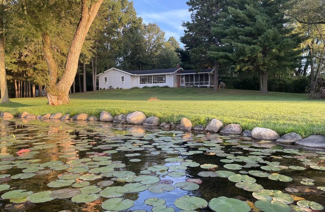Private, newly renovated lakefront cottage on 10+ acres of land.