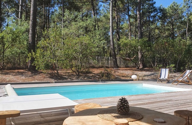 Quiet wooden house at the edge of the forest with heated pool