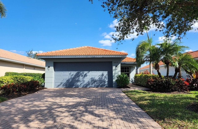 Refreshing Lake View Home in Upscale Estero Community