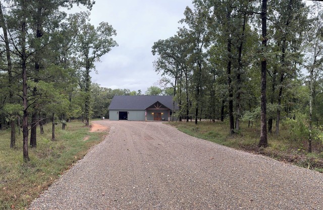Relax and unwind at this peaceful 2-bedroom, 1-bath cabin off Hugo lake.