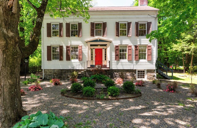 Relax in Style at Historic Modern on Main with Modern Amenities & Wooded Views