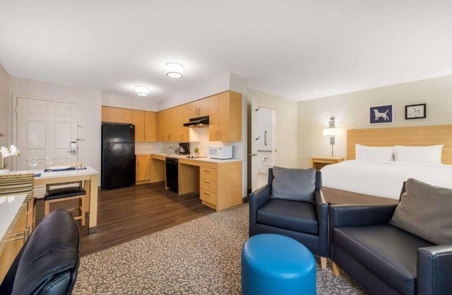 Relaxed and Roomy Suite with Fitness Center Near NASCAR Hall of Fame – 6 Miles