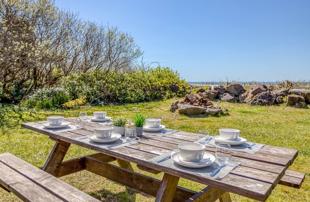 Relaxed, Secluded Oceanfront Cottage has Large Yard and Access to Miles of Beach