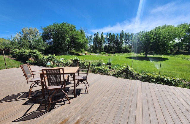 Relaxing cabin with a beautiful deck surrounded by gardens!