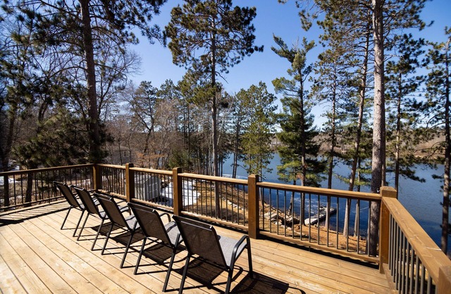 Relaxing retreat on Rice Lake! Quiet lake views w/full deck, fire pit, & hot tub
