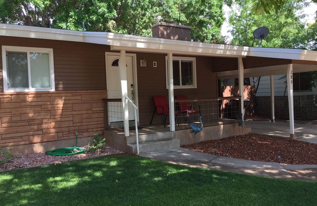 Remodeled in-town beauty with Mountain Views! Large, fully fenced back yard.
