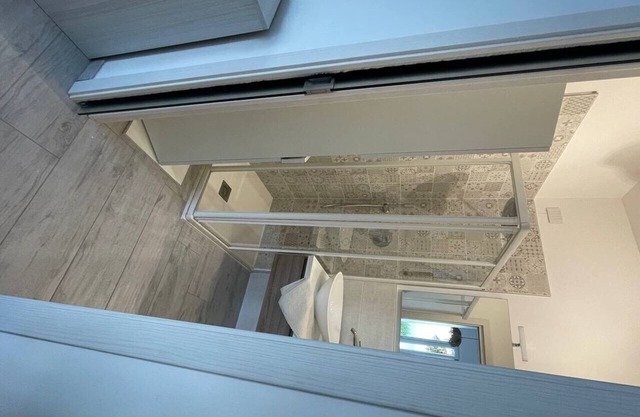 Renovated apartment with parking and small condominium beach