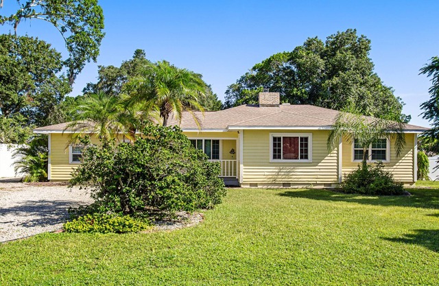Renovated dog-friendly home with private, open-air pool, screened patio & yard