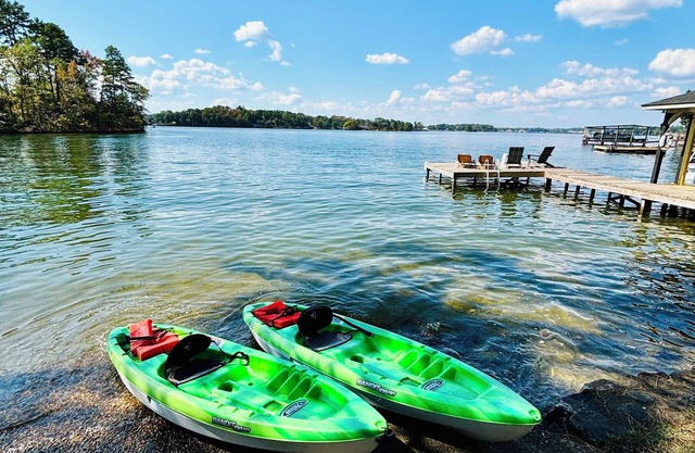 Renovated lake front home with great views & swim dock!