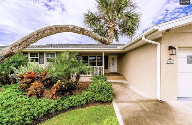 Riverside Retreat- 3/3 with pool, dock, grill 2 block walk to the beach!
