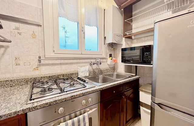 Roibooking Orange apartment Milano