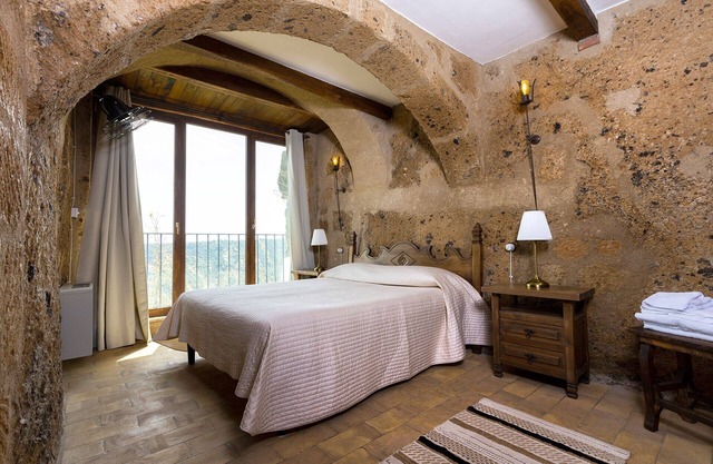 Romantic home carved into the rock with breathtaking views