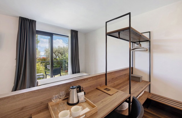 Room 'Insula Felix Tripla Vista Lago' with Shared Terrace, Wi-Fi and Air Conditioning