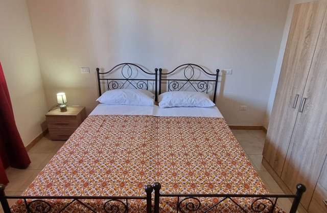 Room with breakfast included in cottage Holiday home in Palmi.