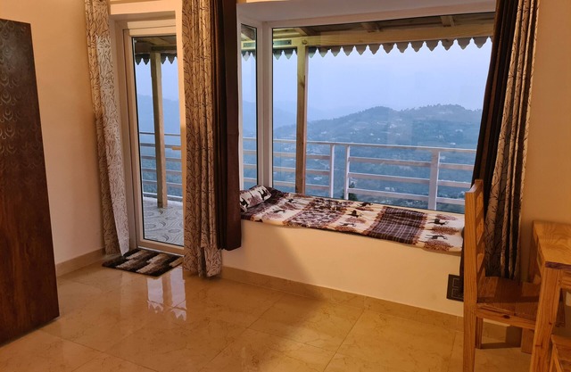 Rooms with Himalayan view at the height of 7050 feet