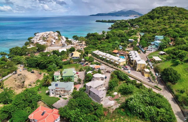 Roomy [1,001 sq ft] two bedroom Unit, steps away from white sand beach.
