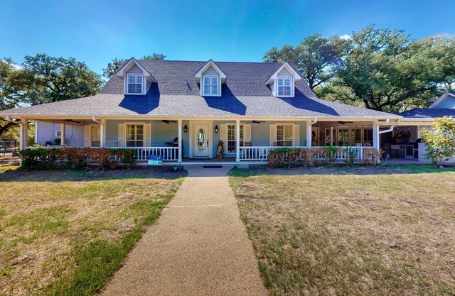 Scenic 30-acre retreat with pool, hot tub, batting cage, Ping-Pong, & basketball