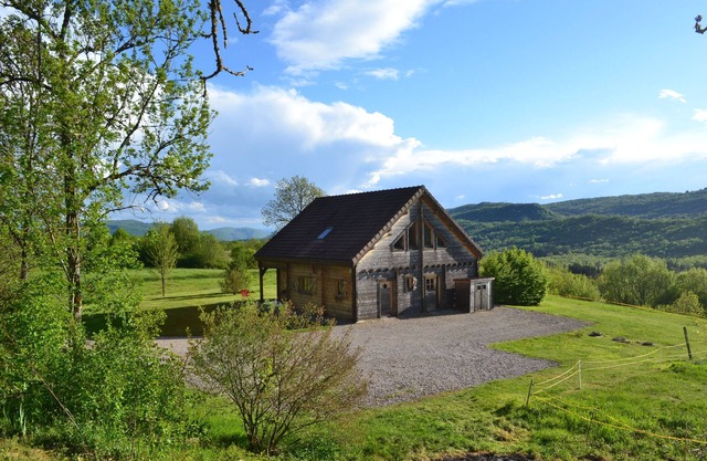 Secluded chalet in the sun with breathtaking views of a wooded valley