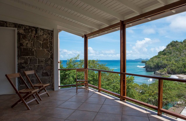 Secluded villa overlooking black sand beach