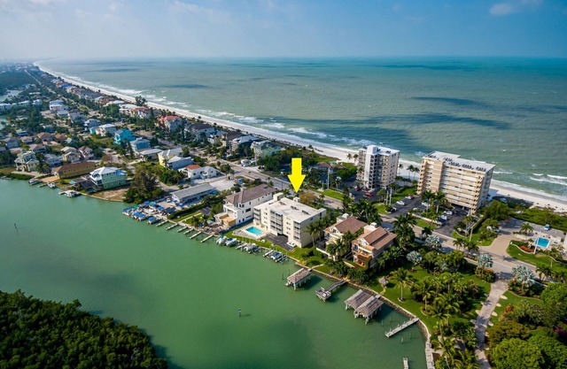 SEPTEMBER SPECIAL! Steps to the Beach, Beautiful Back Water Views!
