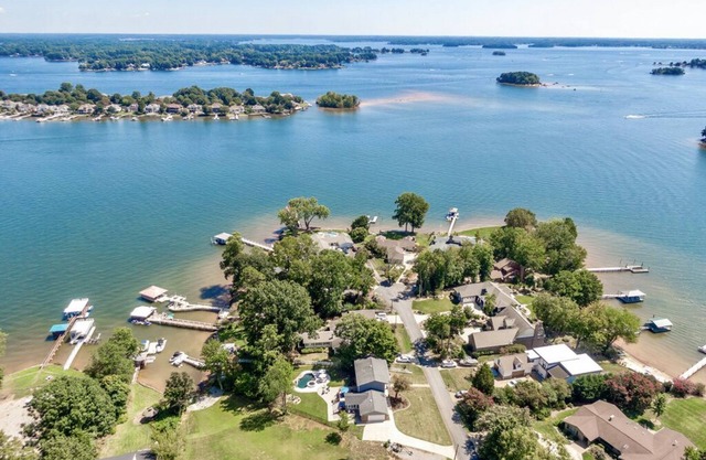 Serene waterfront house on Lake Norman with pool, spa, and private dock
