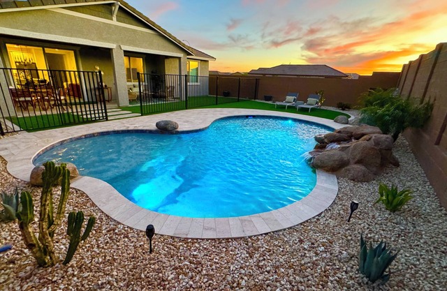 Serene West Valley oasis with pool, waterfall, hot tub and glowing sunset views