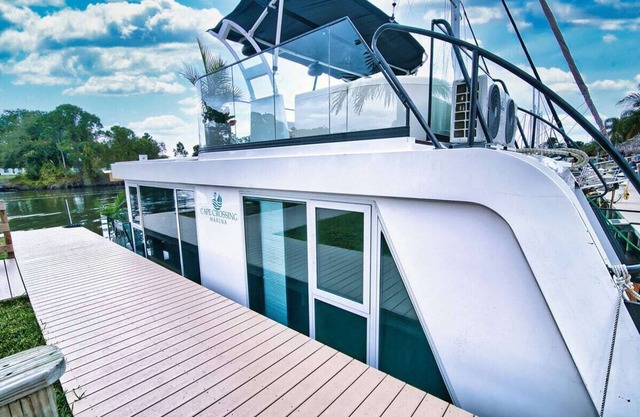Shangri La: Waterfront Boat Bungalow with Resort Access!