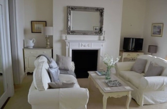 Sidmouth seafront apartment, just yards from beach, tastefully furnished.