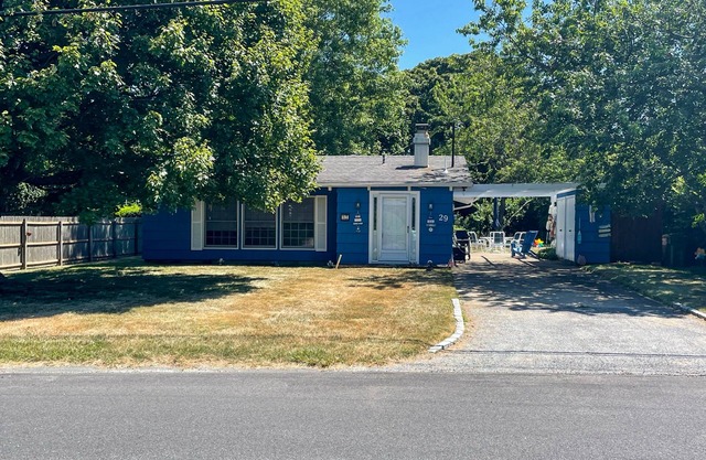 Single-story home with W/D, patio & outdoor shower - minutes from private beach