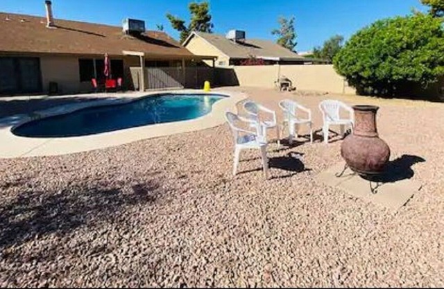 Single story pool home with large backyard. Fully remodeled & centrally located.