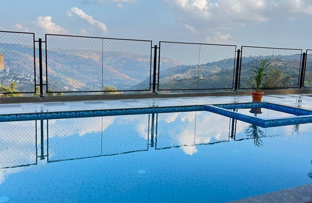 Skyline Serenity by Joy Suites