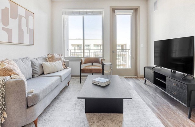 Sleek Sloan's Lake 2BR w/ Deck, Gym & Game Room, near Park, by Blueground