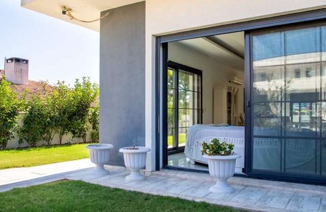 Sleek Villa with Private Pool and Garden in Cesme