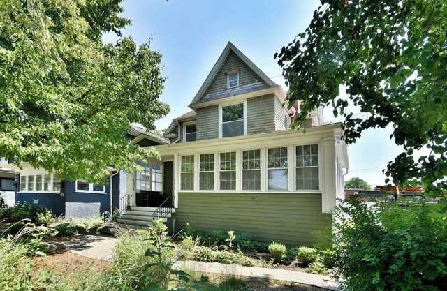 Sleeps 12 Comfortably with 8 Bedrooms, 3 Full Bathrooms, 2 Kitchens and Parking