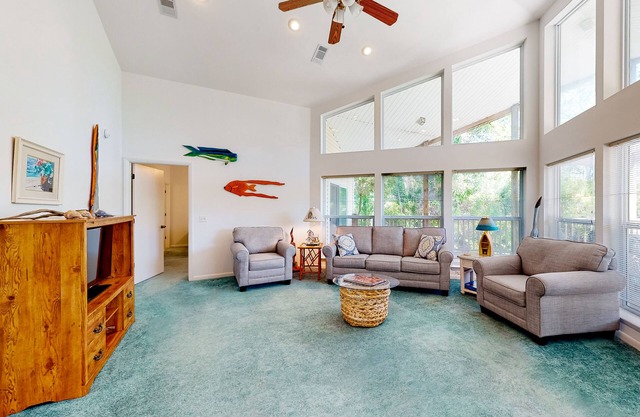 Snowbird-friendly home near the beach with deck, outdoor shower, W/D