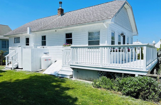 Soak in enchanting water views. Fully-fenced yard for family and pets!