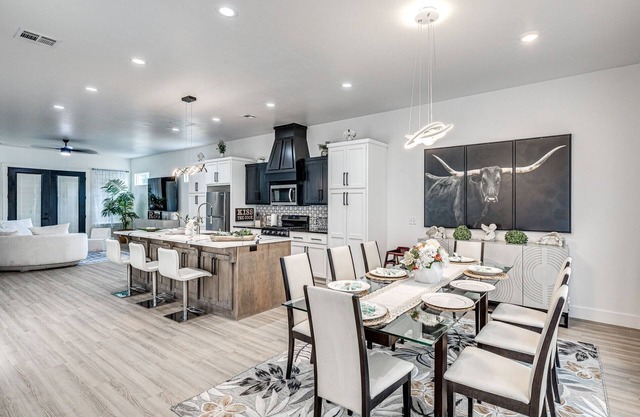 SOLENA VIP OKC: Heated pool, Jacuzzi, grill, pool table outside; cozy interior.