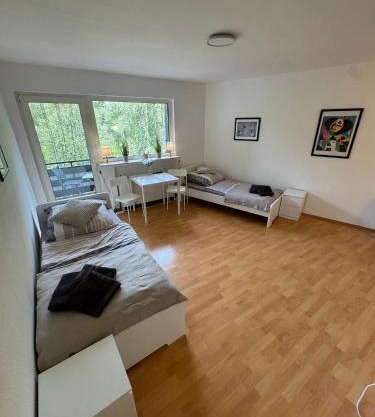 Sonniges CityNest Apartment mit Balkon und bester Verkehrsanbindung Komplette Unterkunft