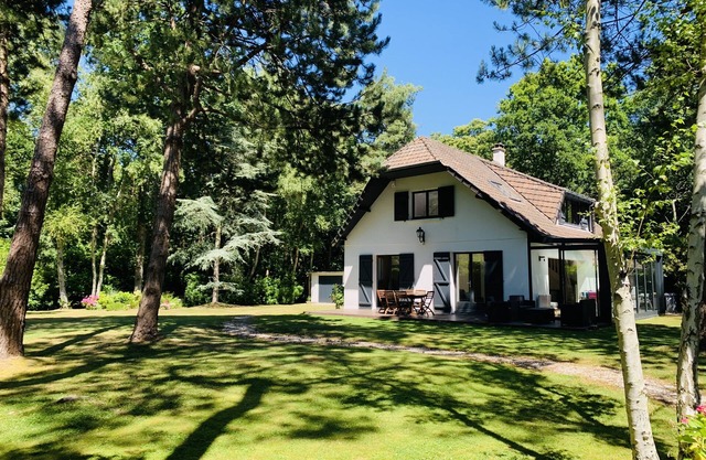 Spacious house in the heart of a large garden on the edge of the forest
