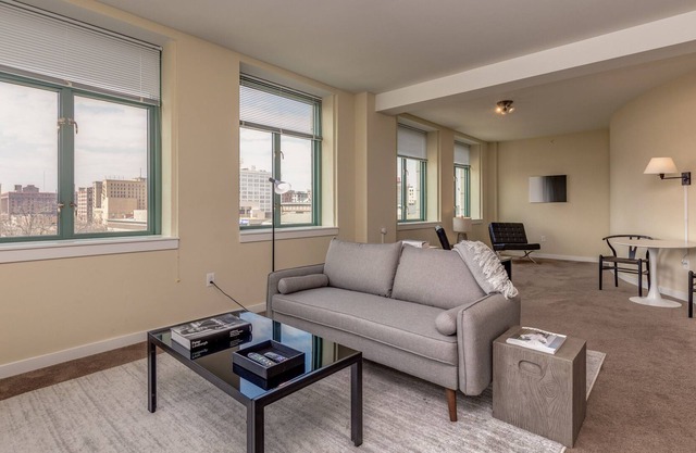 Spacious 2BR Near Arch, Dome, DT | Free Parking + Rooftop | Zencity