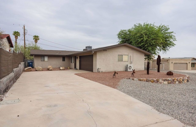 Spacious 4-bedroom house in serene Lake Havasu City with a large fenced yard!